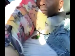 White mega-slut rides black cock in a car