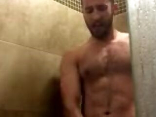 hairy hottie shoots a gigantic fountain in the shower